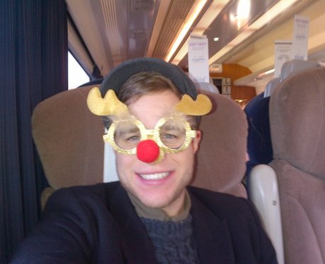 Olly Murs with a reindeer mask