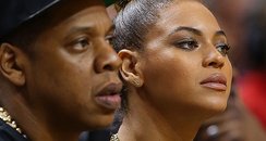 Beyonce and Jay-Z watch basketball together