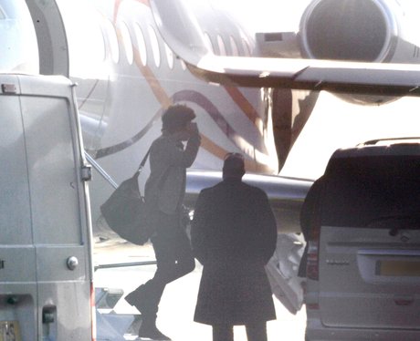 Harry Styles arrives in London with Taylor Swift