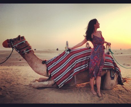 Katy Perry with a camel in Dubai