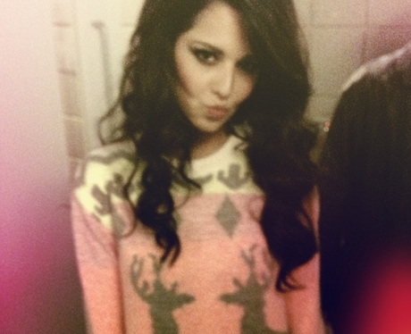 Cheryl Cole wearing a christmas jumper