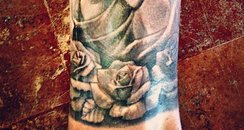 Justin bieber's new rose tattoo