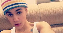 Justin Bieber wearing a bobble hat
