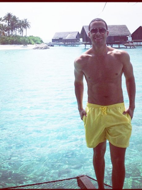 Marvin Humes of JLS wearing yellow swimming shorts