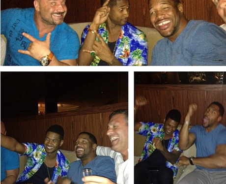 Usher wearing a hawaiian shirt