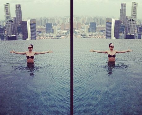 Jesse J in a swimming pool while on holiday