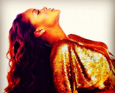 Rihanna wearing gold outfit