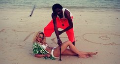 Rita Ora with snoop dog on the  beach