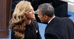 Barack Obama greets singer Beyonce