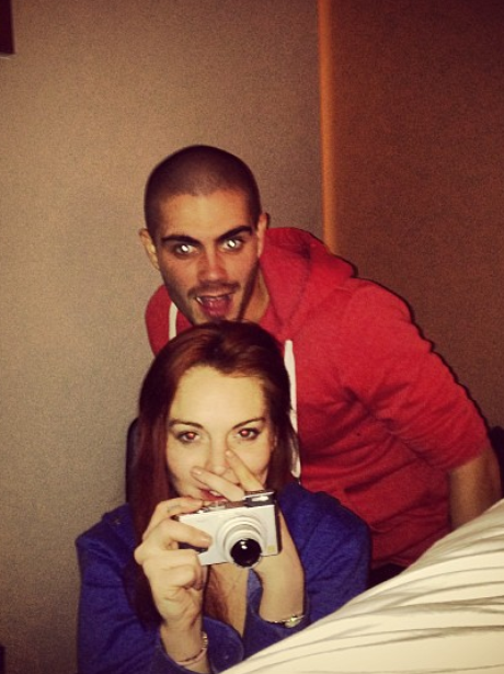 Linsay Lohan and Max George in a hotel