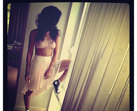 Rihanna wears a pink skirt on her Instagram account