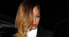 Rihanna with long hair on a night out