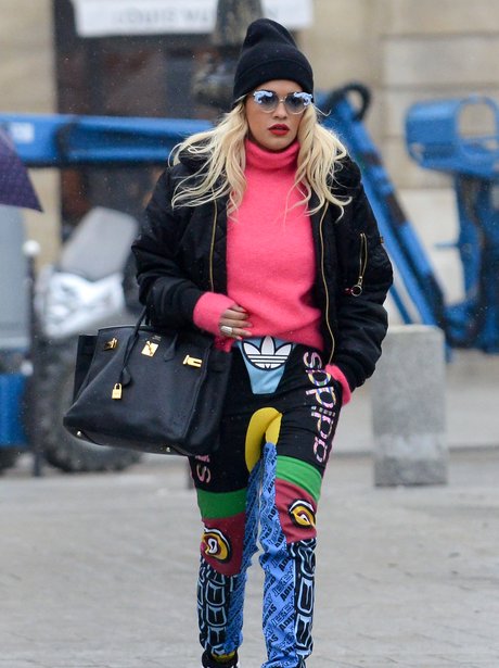 Rits Ora wearing colourful trousers in Paris