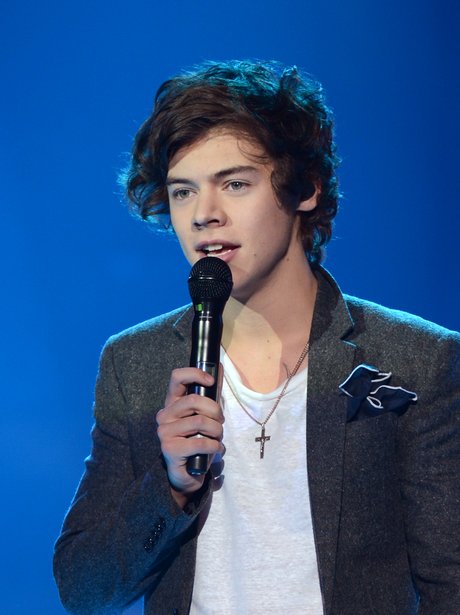 Harry Styles of One Direction on stage