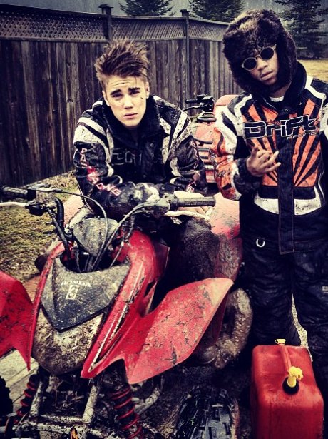 Justin Bieber on a quad bike with friends