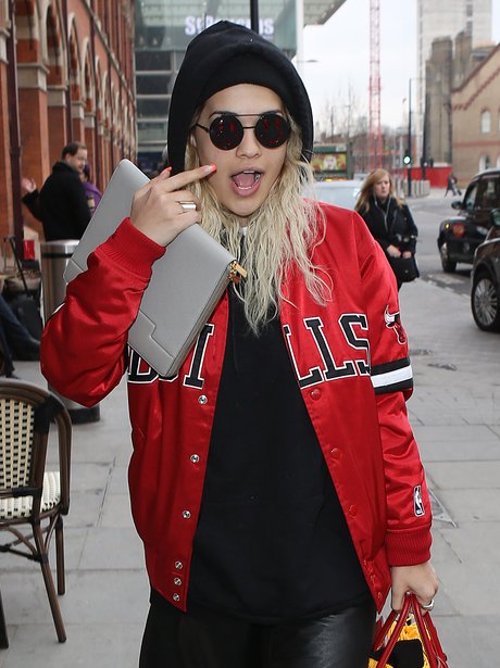 Rita Ora wearing glasses out in London