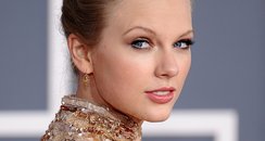 Taylor Swift wearing a top knot