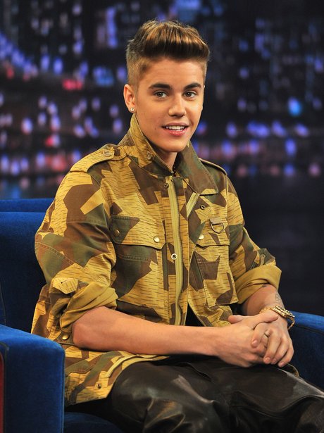 Justin Bieber wearing a camo shirt