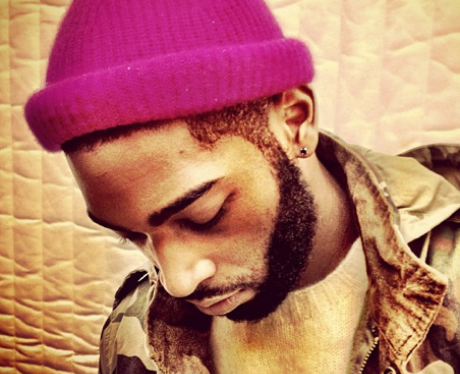 Tinie Tempah poses in a pink hat on Instagram
