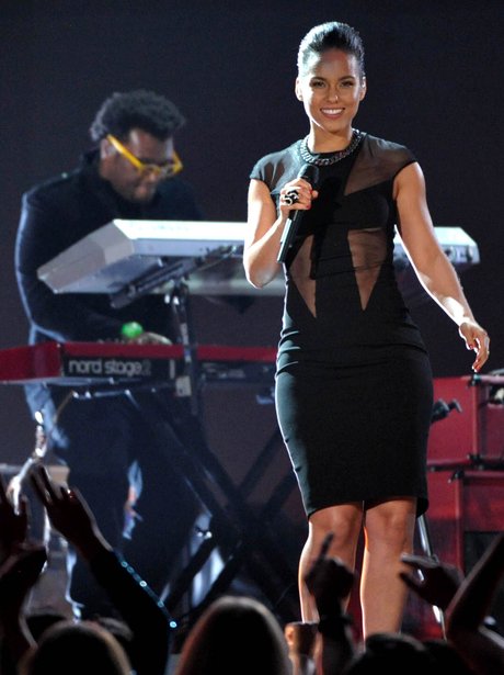 Adam Levin of Maroon 5 and Alicia Keys perform at 