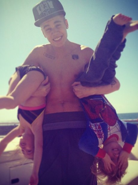 Justin Bieber with his brother and sister
