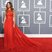Image 1: Rihanna wearing a red dress arrives at the Grammy Awards 2013
