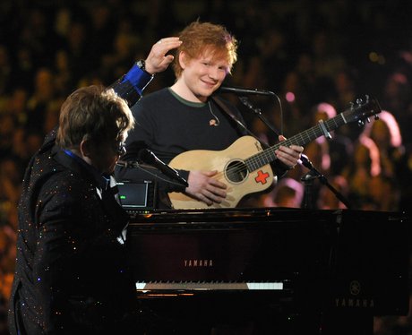 Sir Elton John and Ed Sheeran perform on stage at