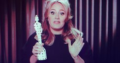 Adele accepts her Best British Singl