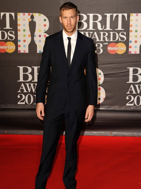 Calvin Harris wearing a suit at the BRIT Awards 2013