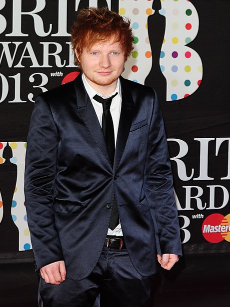 Ed Sheeran wearing a suit and tie at 2013 BRIT Awards
