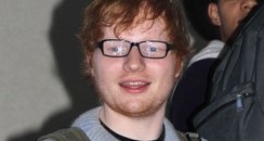 Ed Sheeran wearing glasses at LAX airport