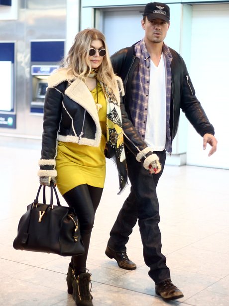 Fergie arrives at Heathrow Airport after announcing pregnancy