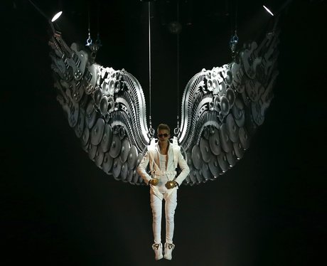 Justin Bieber drops in from the arena ceiling on his 'Believe' tour