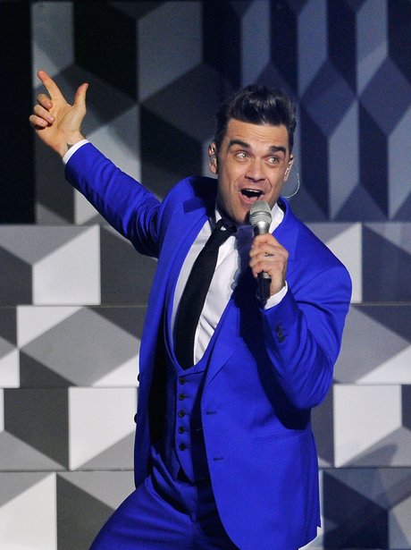 Robbie Williams live on stage at the BRIT Awards 