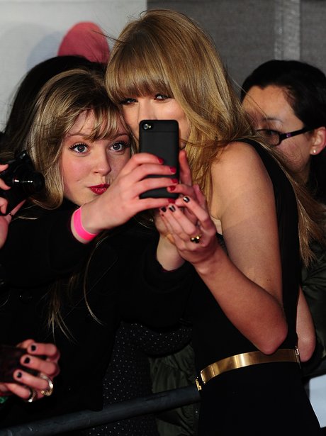 Taylor Swift and fans at the BRIT Award 2013