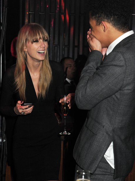 Taylor Swift exchanging numbers with Jordan from Rizzle Kicks