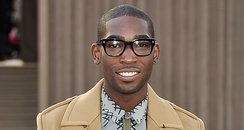  Tinie Tempah wearing Burberry, arrives at the Bur