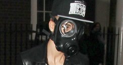 Justin Bieber wearing a gas mask