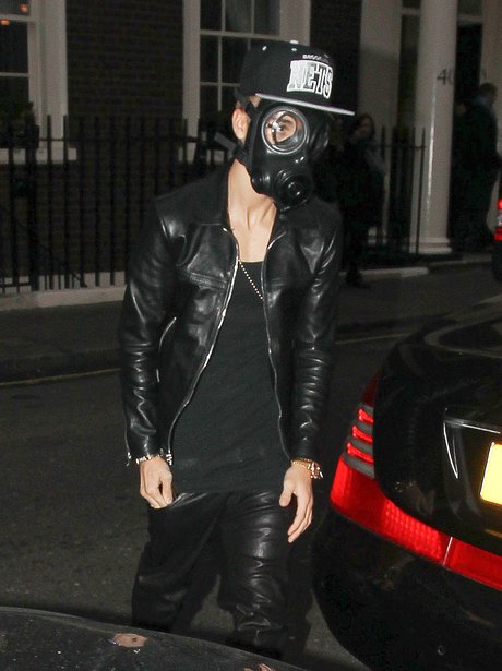 Justin Bieber wearing a gas mask