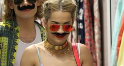 Rita Ora wearing a moustache