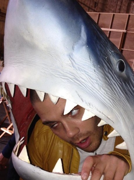 Max George with a shark head