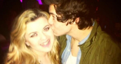 Harry Styles kissing a fan