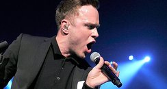 Olly Murs performs on stage 