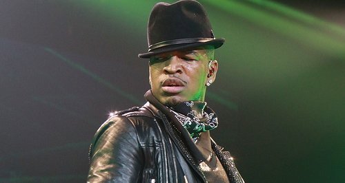 Ne-Yo performs on stage