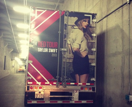 Taylor Swift shares a snap of a tour poster