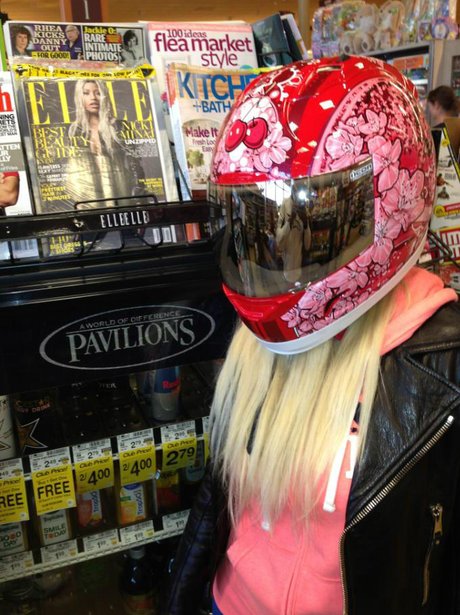 Nicki Minaj wearing a bike helemt