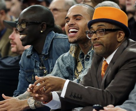 Chris Brown and Spike Lee take in a basketball game