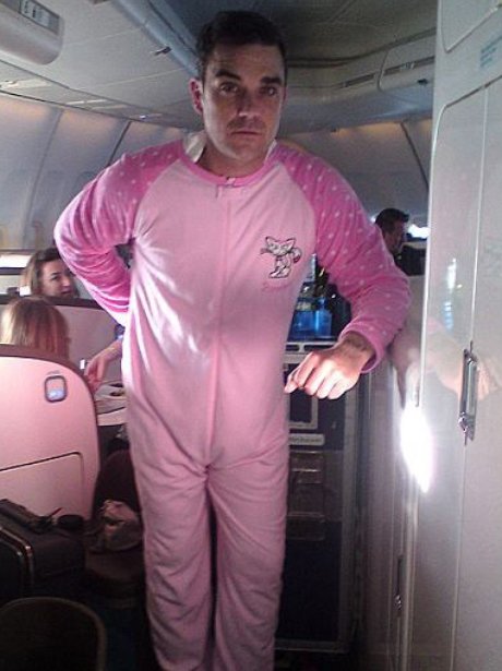 Robbie Williams in a onesie