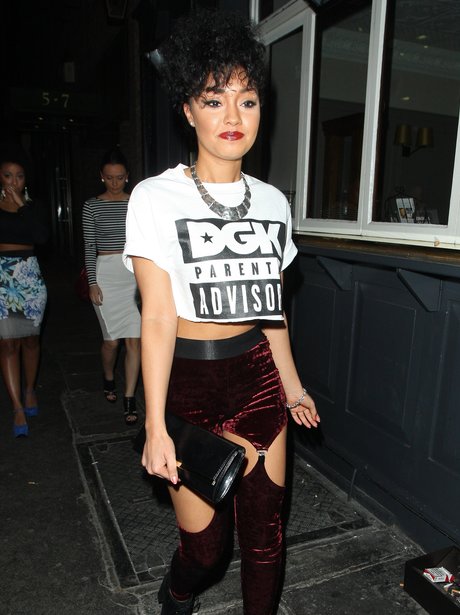 Leigh-Anne Pinnock wearing maroon velvet trousers