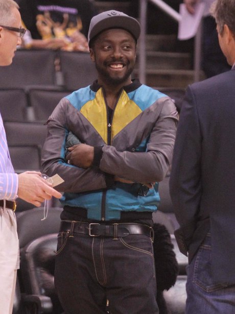 Will.i.am watching the basketball in Los Angeles